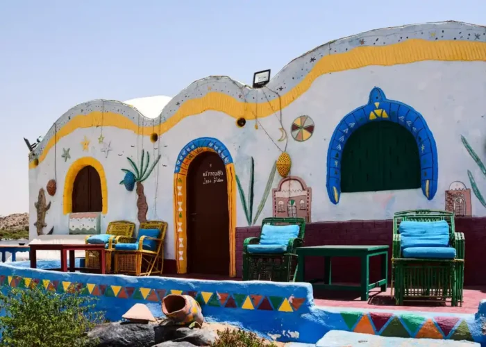 Colorful houses at the Nubian Village during our Abu Simbel and Aswan from Luxor tour