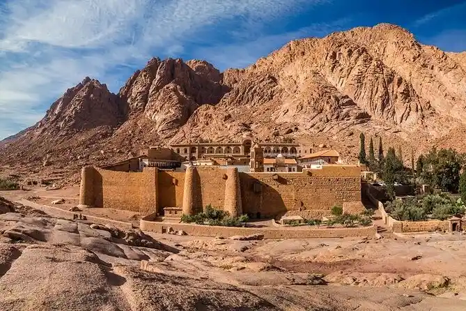 Panoramic collage of Egypt attractions featuring the Giza Pyramids, Sharm El Sheikh coral reefs, and the historic St. Catherine Monastery at Mount Sinai.