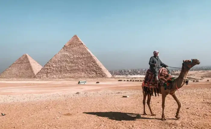 High definition photography of the Giza Pyramids and the Great Sphinx of Giza on a sunny day in Cairo.