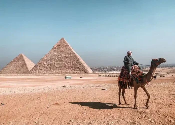 High definition photography of the Giza Pyramids and the Great Sphinx of Giza on a sunny day in Cairo.